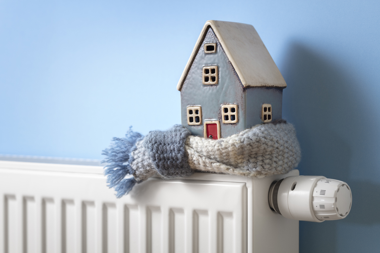 Little House with Scarf on Heater