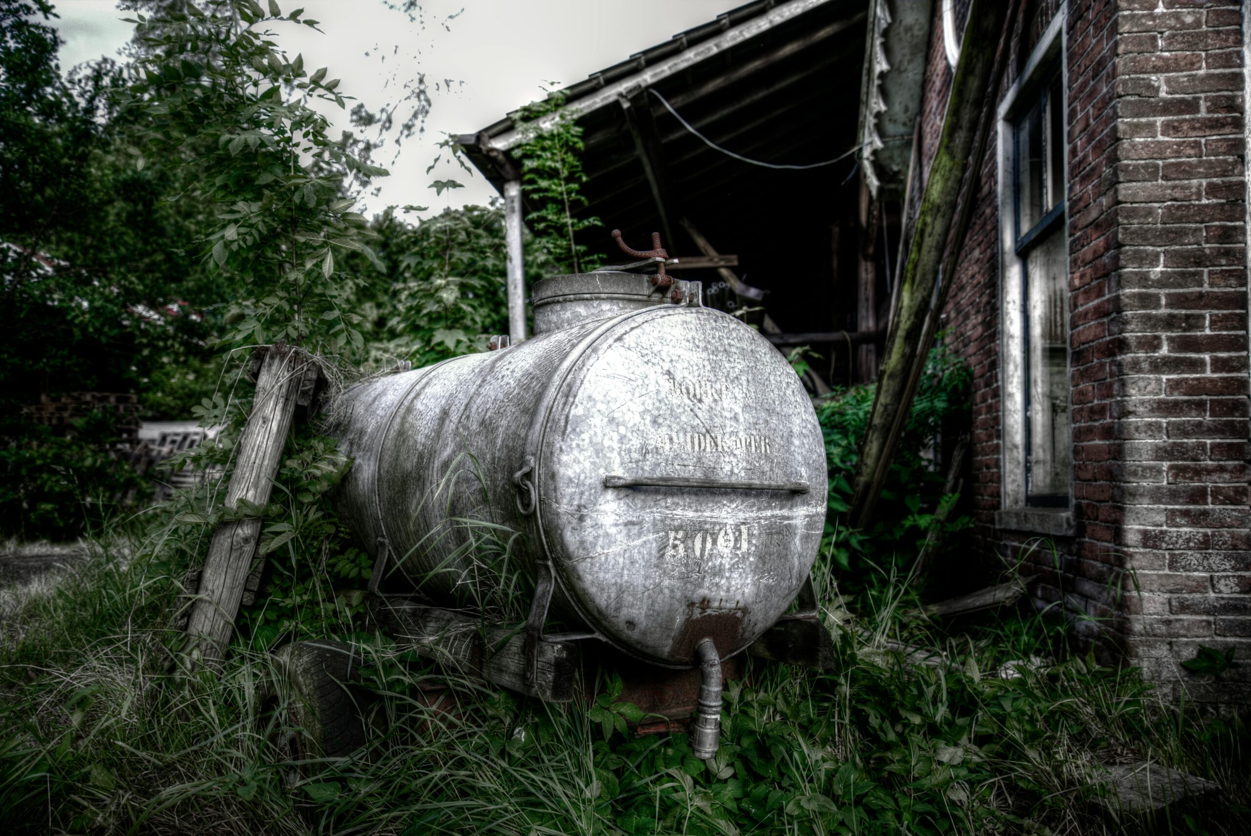 Water softener system located outside the house.